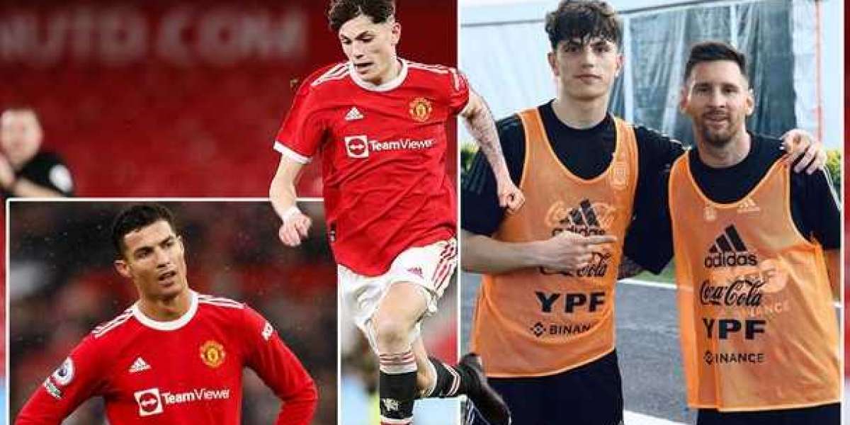 Manchester United's wonderkid poses with Lionel Messi and gives his view on Cristiano Ronaldo.