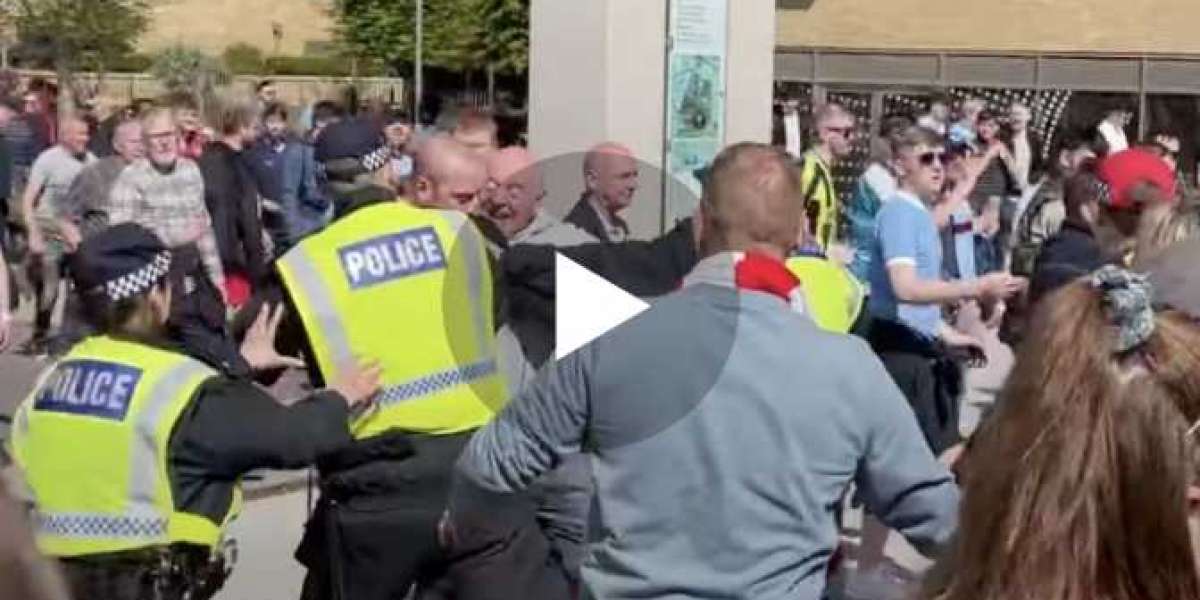 (Video) Shocking video as Manchester City and Liverpool fans scuffle at Wembley.