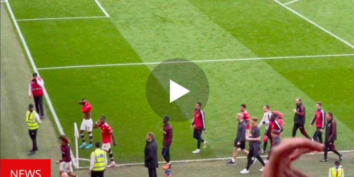 (video) French midfielder Paul Pogba cups his ears toward Stretford End as fans boo him.