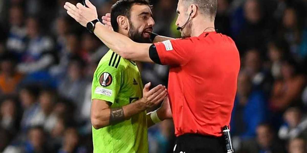 Manchester United midfielder Bruno Fernandes criticizes referee after Real Sociedad win.