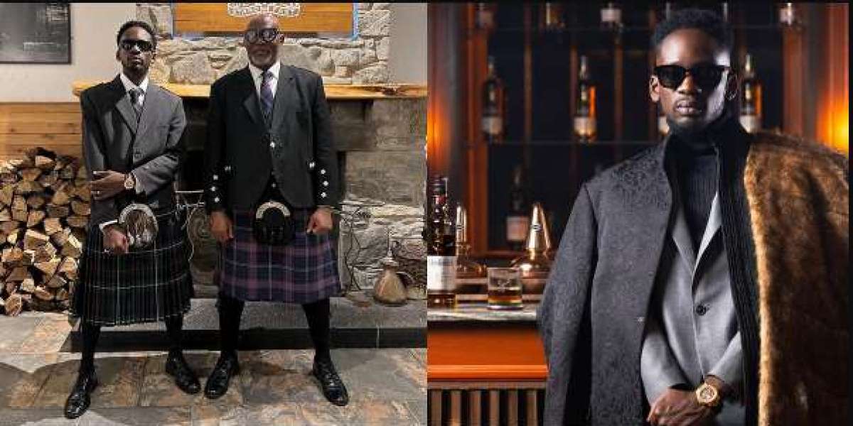 “Abeg we are not part of any secret society” — Mr Eazi clears the air on outfit as he poses with RMD